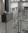 Торговое оборудование для магазина одежды включает стеллажи, стойки, зеркала, торговые прилавки.