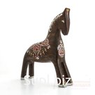 A bay horse with a dotted pattern on its back