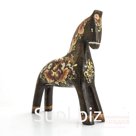 A bay horse with a fairy flower