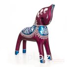 Cherry-colored horse in blue attire